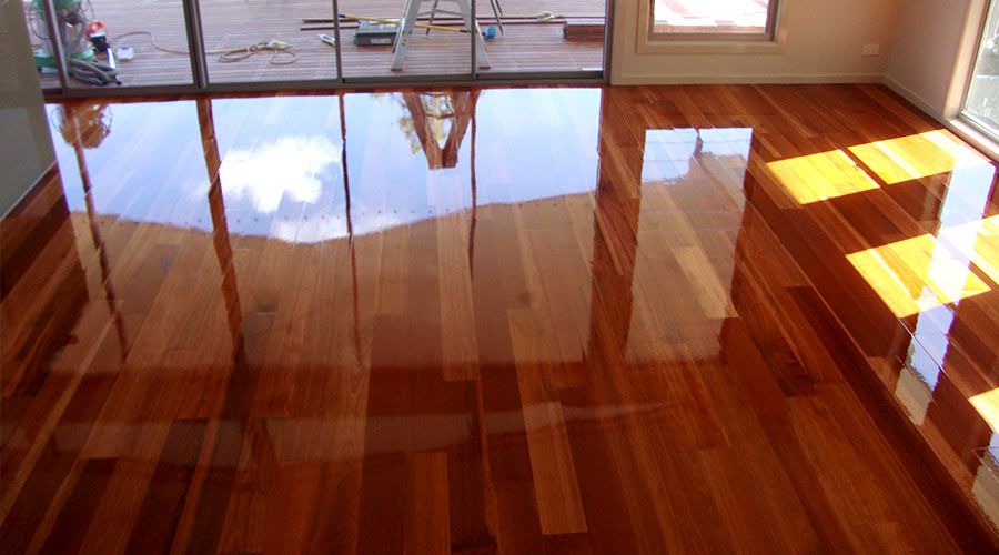 A freshly sanded and polished hardwood floor in a Brisbane home